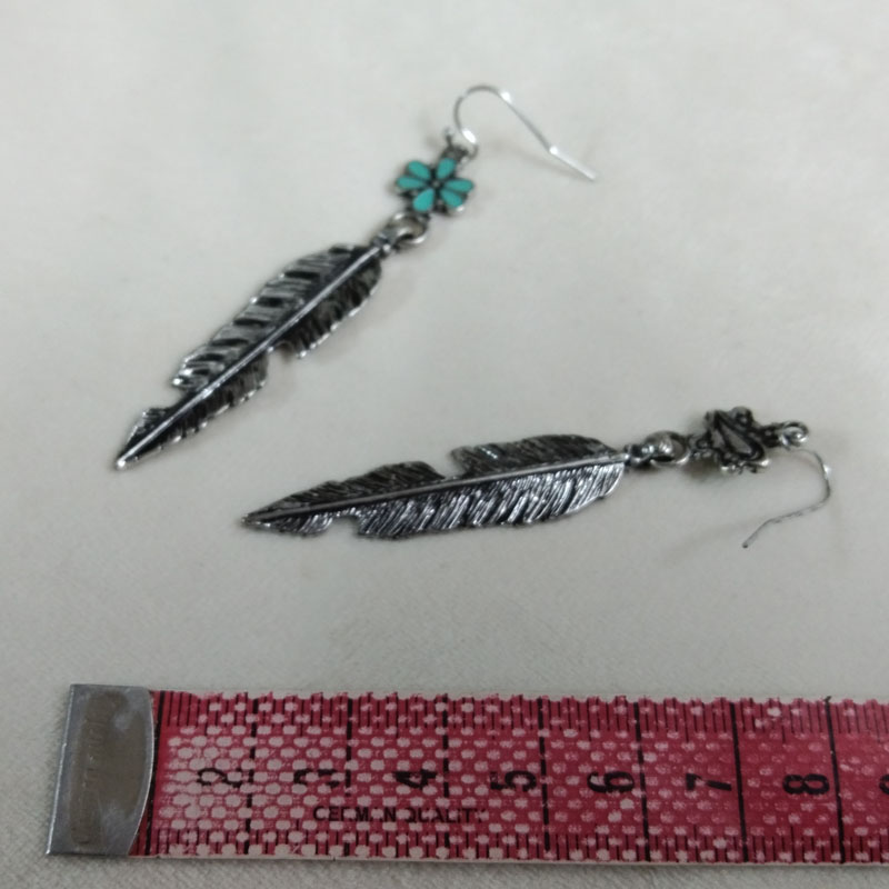 Antieke zilveren veer oorbelle - Vintage Fashion Jewelry Brands recensie en prijs